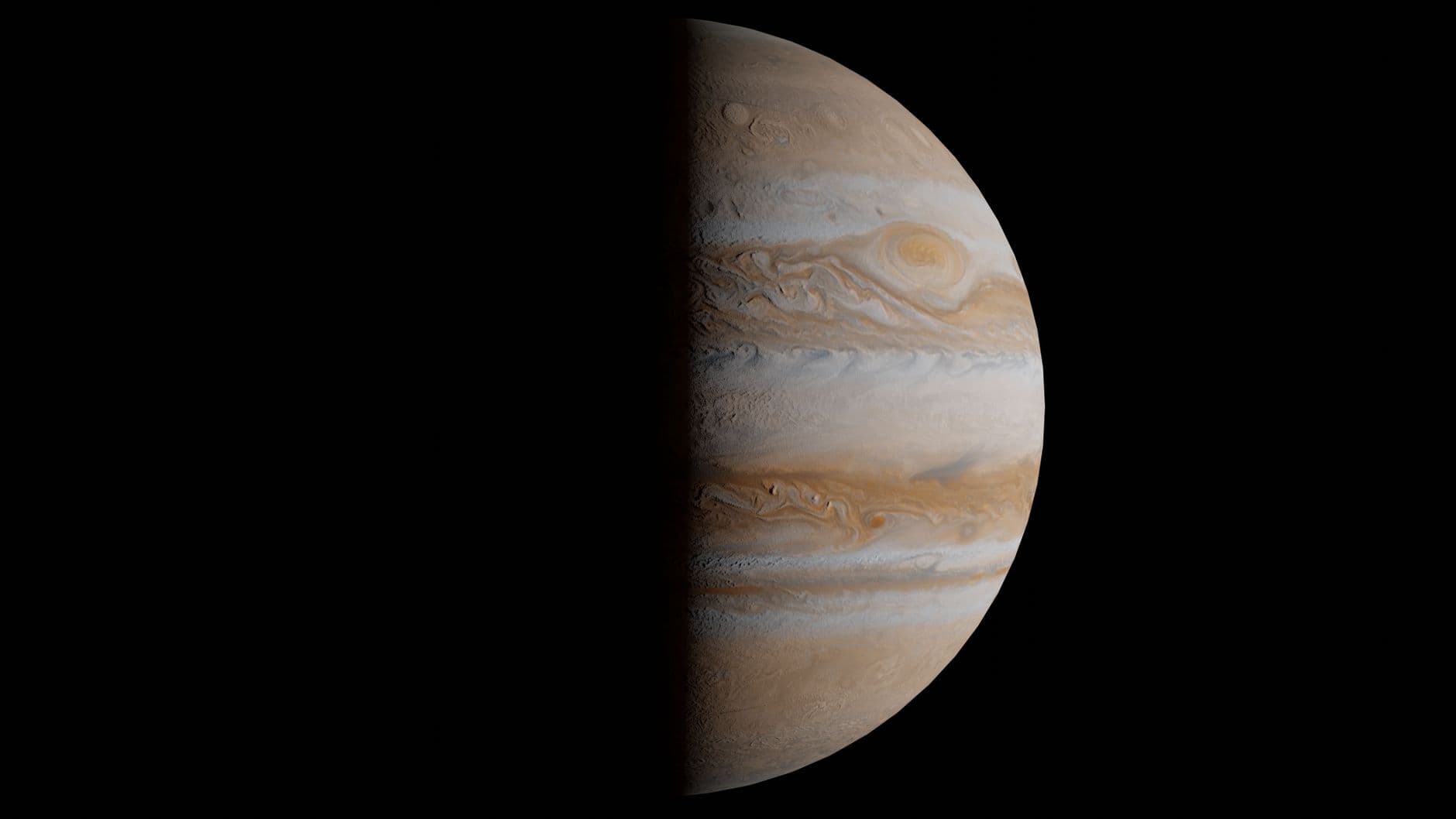 Stunning half view of Jupiter with vibrant gas clouds, captured in space.